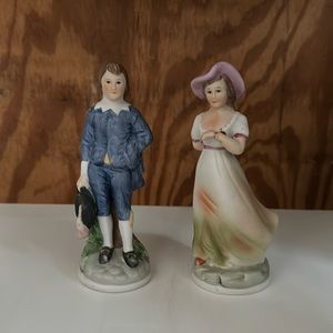 porcelain blue boy and pink lady figurines